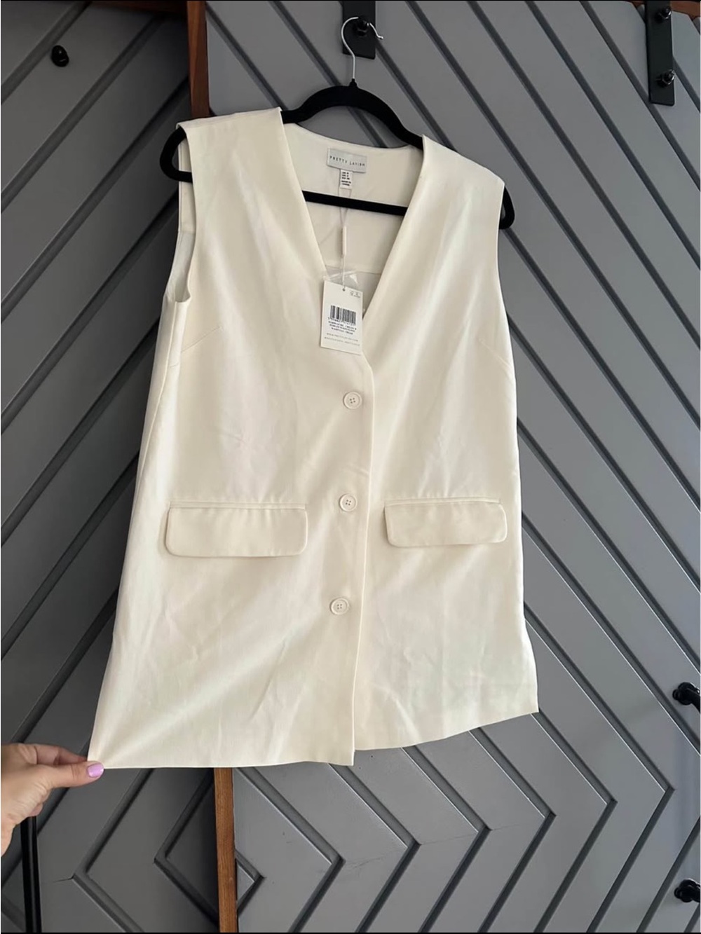 Sleeveless Cream Button-Front Vest Top